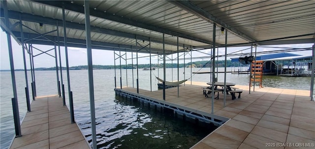 44 Port Bagnell Rd, Eldon, MO 65026 - dock area featuring a water view and boat lift