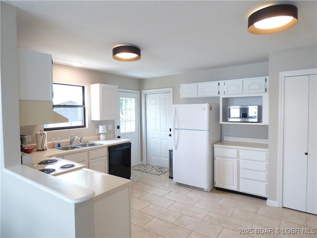 44 Port Bagnell Rd, Eldon, MO 65026 - kitchen with white appliances, a sink, light countertops, and white cabinets