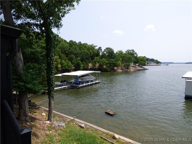 44 Port Bagnell Rd, Eldon, MO 65026 - dock featuring a water view and boat lift