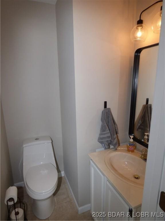 44 Port Bagnell Rd, Eldon, MO 65026 - half bath featuring vanity, toilet, tile patterned flooring, and baseboards