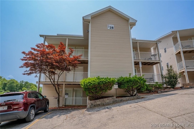 28 Wheel House Cir Unit A-4, Four Seasons, MO 65049 - view of property with uncovered parking