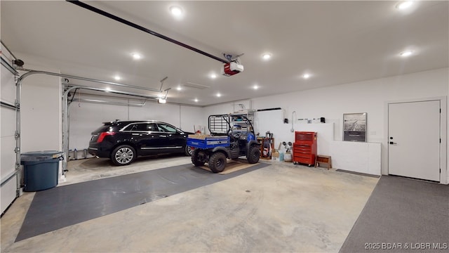 481 Comanche Rd, Lake Ozark, MO 65049 - garage with a garage door opener and recessed lighting