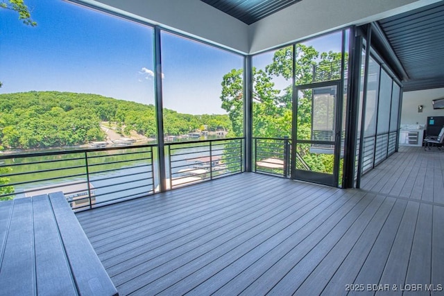 481 Comanche Rd, Lake Ozark, MO 65049 - unfurnished sunroom featuring a water view