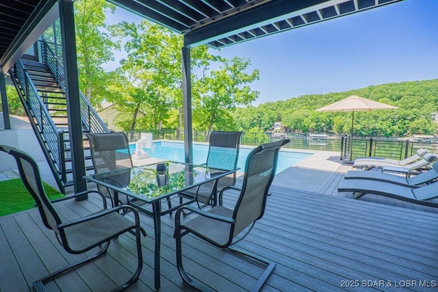 481 Comanche Rd, Lake Ozark, MO 65049 - deck featuring stairway and outdoor dining space