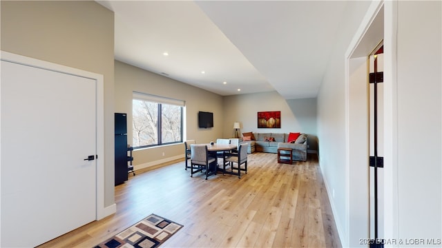 481 Comanche Rd, Lake Ozark, MO 65049 - living room featuring light wood-type flooring, baseboards, and recessed lighting