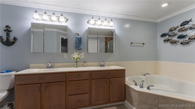 149 Snead Cir, Lake Ozark, MO 65049 - full bathroom featuring toilet, a bath, double vanity, crown molding, and tile patterned floors