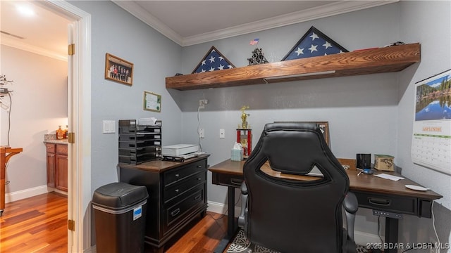 149 Snead Cir, Lake Ozark, MO 65049 - office area with wood finished floors, crown molding, and baseboards