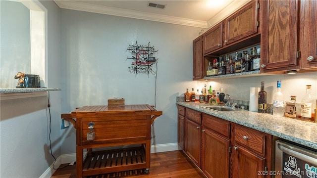 149 Snead Cir, Lake Ozark, MO 65049 - indoor wet bar featuring dishwasher, crown molding, baseboards, and dark wood finished floors