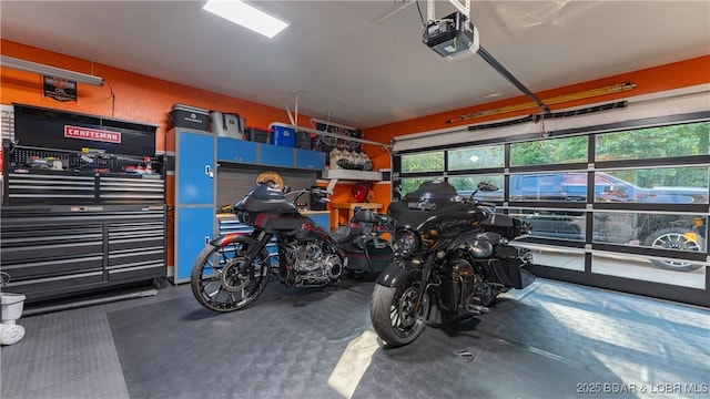 149 Snead Cir, Lake Ozark, MO 65049 - garage featuring a garage door opener