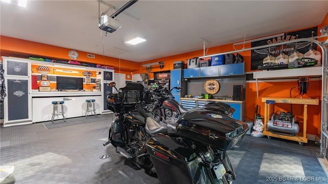 149 Snead Cir, Lake Ozark, MO 65049 - garage with a garage door opener