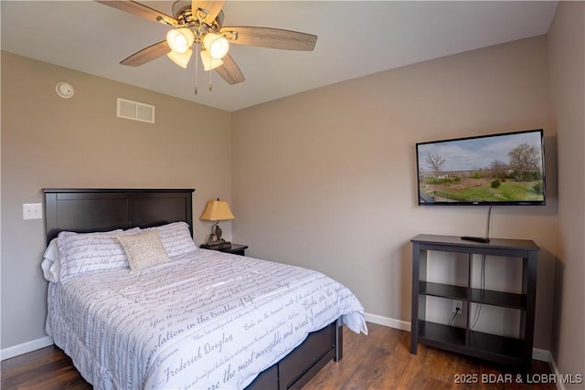 4715 Inlet Ln, Osage Beach, MO 65065 - bedroom featuring dark wood finished floors, baseboards, and a ceiling fan