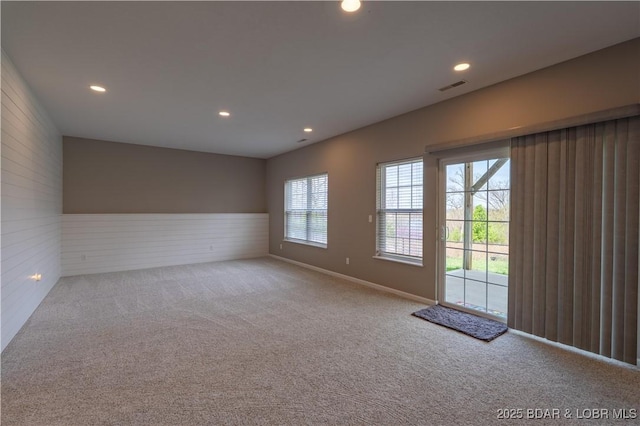4715 Inlet Ln, Osage Beach, MO 65065 - carpeted empty room with recessed lighting and wood walls