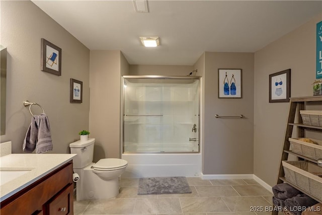4715 Inlet Ln, Osage Beach, MO 65065 - bathroom featuring vanity, toilet, shower / bath combination with glass door, tile patterned flooring, and baseboards