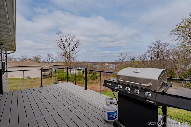 4715 Inlet Ln, Osage Beach, MO 65065 - wooden deck featuring area for grilling and a lawn