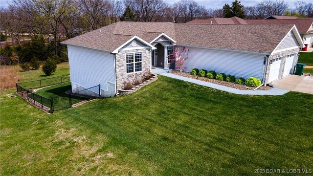 4715 Inlet Ln, Osage Beach, MO 65065 - ranch-style home featuring stone siding, an attached garage, roof with shingles, and concrete driveway