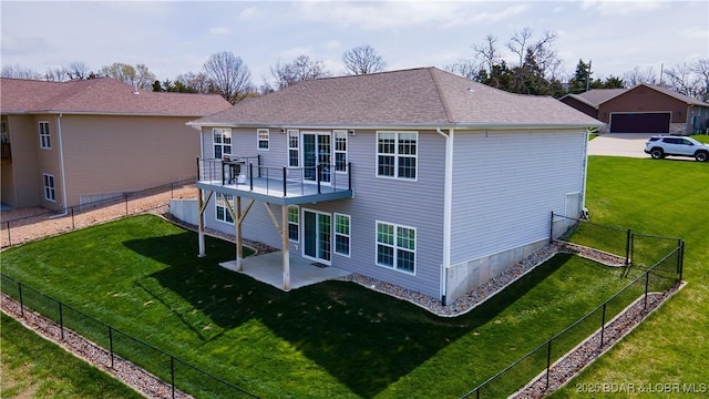 4715 Inlet Ln, Osage Beach, MO 65065 - back of property with a deck, a patio area, and roof with shingles