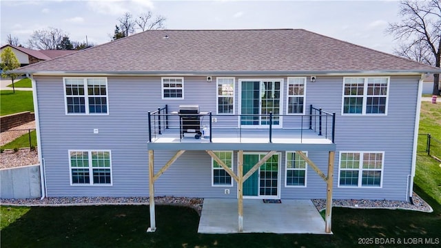 4715 Inlet Ln, Osage Beach, MO 65065 - rear view of property with a patio, a yard, and a shingled roof