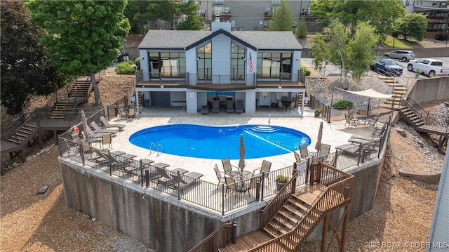 4897 Bridgepoint Dr Unit 311, Osage Beach, MO 65065 - community pool with stairway and a patio area