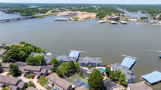 4897 Bridgepoint Dr Unit 311, Osage Beach, MO 65065 - aerial perspective of suburban area featuring a nearby body of water and a notable bridge