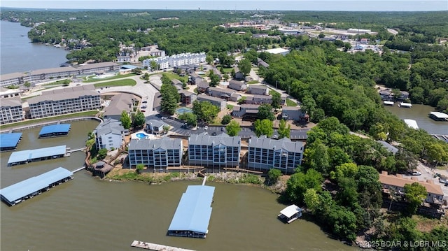 4897 Bridgepoint Dr Unit 311, Osage Beach, MO 65065 - aerial view of a nearby body of water and a forest