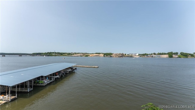 4897 Bridgepoint Dr Unit 311, Osage Beach, MO 65065 - dock area with a water view and boat lift