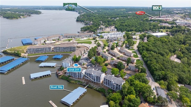 4897 Bridgepoint Dr Unit 311, Osage Beach, MO 65065 - drone / aerial view of a nearby body of water