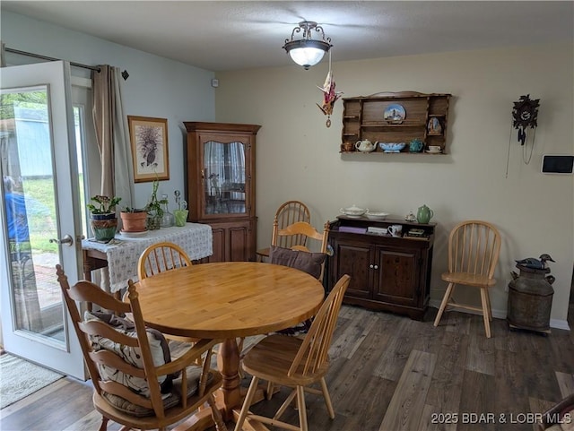 1001 Ha Ha Tonka Rd, Camdenton, MO 65020 - dining room featuring plenty of natural light and wood finished floors