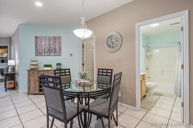 1181 Jeffries Rd Unit B107, Osage Beach, MO 65065 - dining room with light tile patterned flooring, baseboards, and recessed lighting