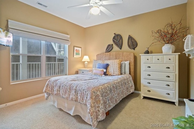 1181 Jeffries Rd Unit B107, Osage Beach, MO 65065 - bedroom with light carpet, baseboards, and a ceiling fan