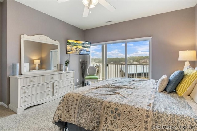 1181 Jeffries Rd Unit B107, Osage Beach, MO 65065 - carpeted bedroom featuring access to outside, baseboards, and a ceiling fan