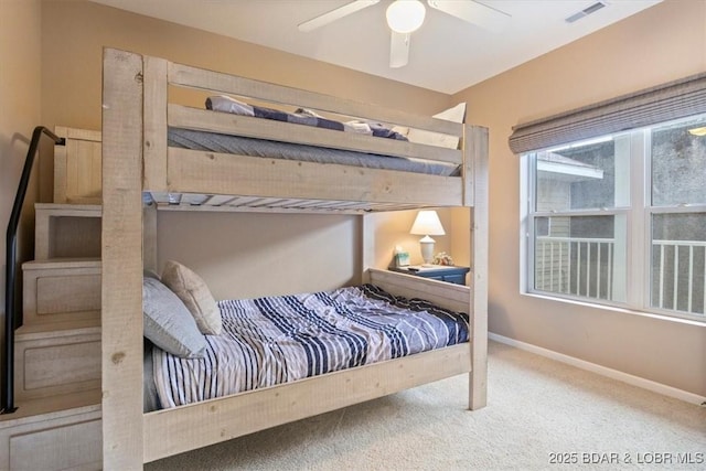 1181 Jeffries Rd Unit B107, Osage Beach, MO 65065 - carpeted bedroom featuring baseboards and a ceiling fan