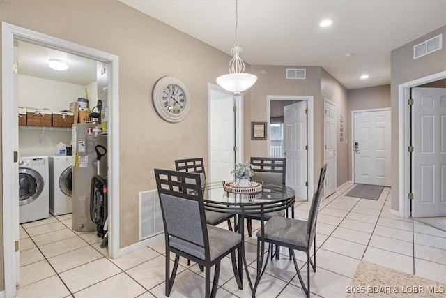 1181 Jeffries Rd Unit B107, Osage Beach, MO 65065 - dining space with washer and dryer, light tile patterned flooring, baseboards, and recessed lighting