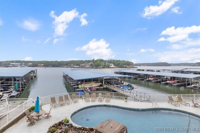 1181 Jeffries Rd Unit B107, Osage Beach, MO 65065 - community pool featuring a water view and a boat dock