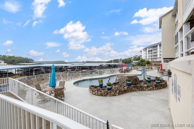1181 Jeffries Rd Unit B107, Osage Beach, MO 65065 - community pool featuring a patio area