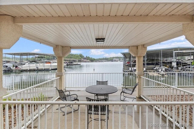 1181 Jeffries Rd Unit B107, Osage Beach, MO 65065 - view of patio with a water view