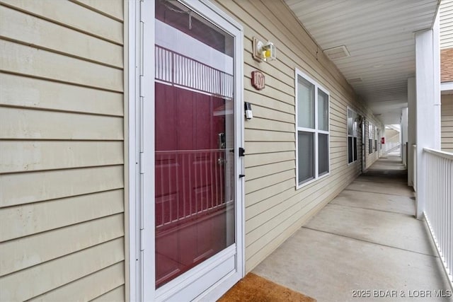 1181 Jeffries Rd Unit B107, Osage Beach, MO 65065 - view of exterior entry with covered porch