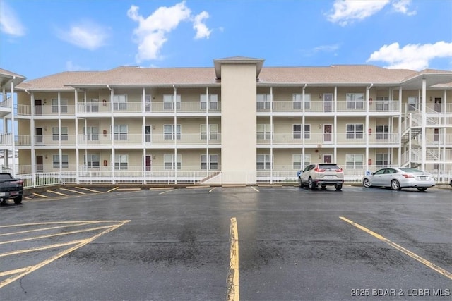1181 Jeffries Rd Unit B107, Osage Beach, MO 65065 - view of apartment building / complex featuring uncovered parking