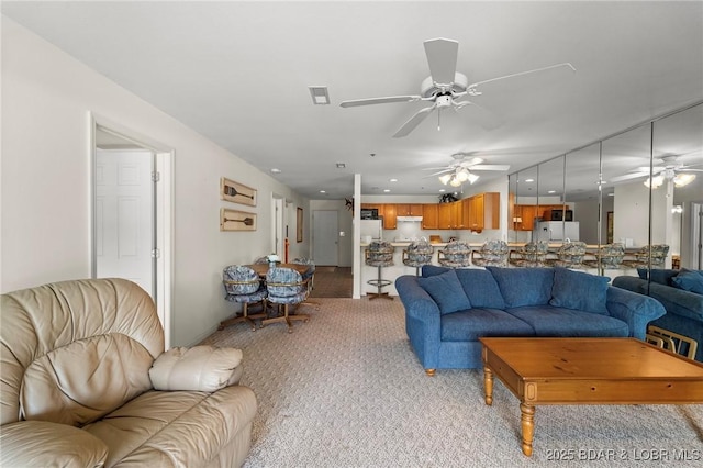 335 Vision Dr Unit 2B, Camdenton, MO 65020 - living area featuring ceiling fan, light carpet, and recessed lighting