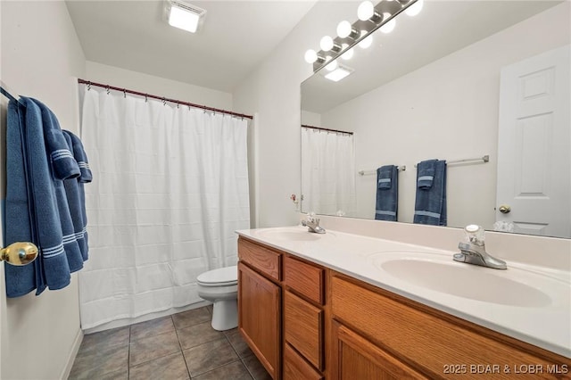 335 Vision Dr Unit 2B, Camdenton, MO 65020 - bathroom with double vanity, toilet, tile patterned floors, and curtained shower