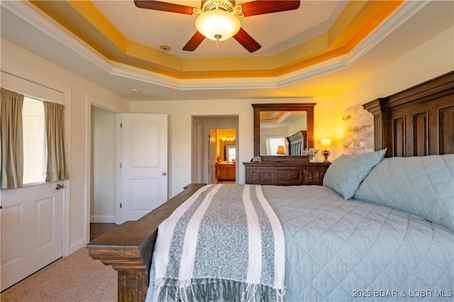 915 Bear Cave Way, Camdenton, MO 65020 - carpeted bedroom with a raised ceiling, ornamental molding, and ceiling fan