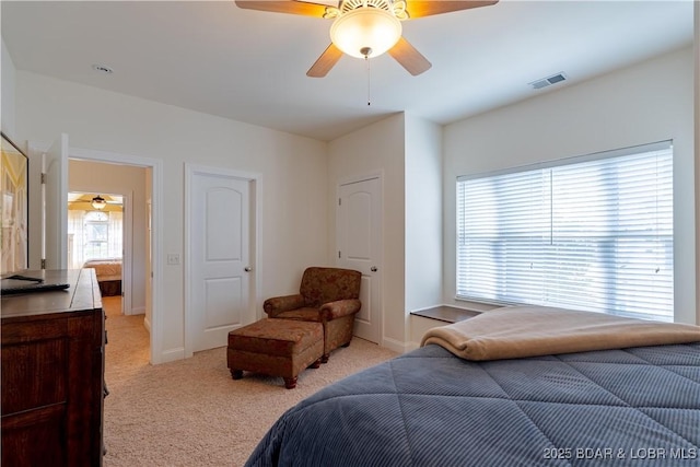 915 Bear Cave Way, Camdenton, MO 65020 - bedroom with light carpet, ceiling fan, and baseboards