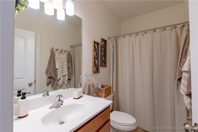 915 Bear Cave Way, Camdenton, MO 65020 - full bath featuring vanity, toilet, and a shower with shower curtain