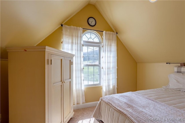 915 Bear Cave Way, Camdenton, MO 65020 - bedroom with light colored carpet, lofted ceiling, and baseboards