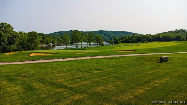 915 Bear Cave Way, Camdenton, MO 65020 - view of community with golf course view, a water view, and a lawn