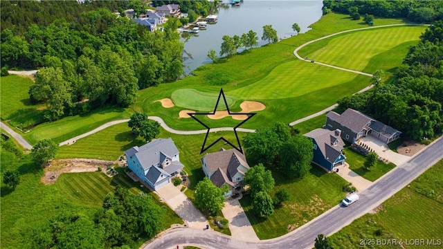 915 Bear Cave Way, Camdenton, MO 65020 - aerial view of property's location with a large body of water, a golf course, and nearby suburban area