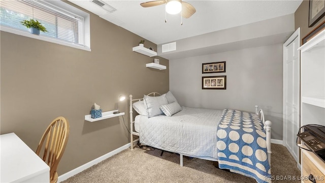 2151 Portside Ln, Osage Beach, MO 65065 - bedroom with carpet, baseboards, and ceiling fan