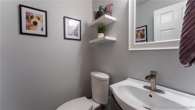 2151 Portside Ln, Osage Beach, MO 65065 - bathroom with toilet and vanity