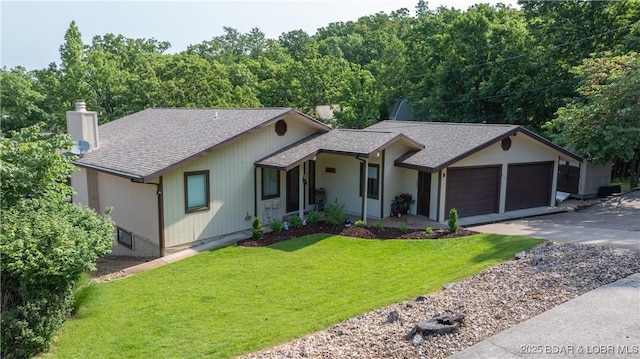 2151 Portside Ln, Osage Beach, MO 65065 - ranch-style home with an attached garage, concrete driveway, a shingled roof, a chimney, and a front lawn
