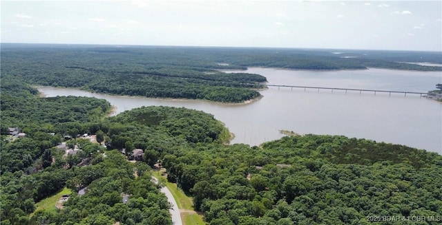 29720 Uu Hwy, Warsaw, MO 65355 - drone / aerial view of a heavily wooded area and a nearby body of water