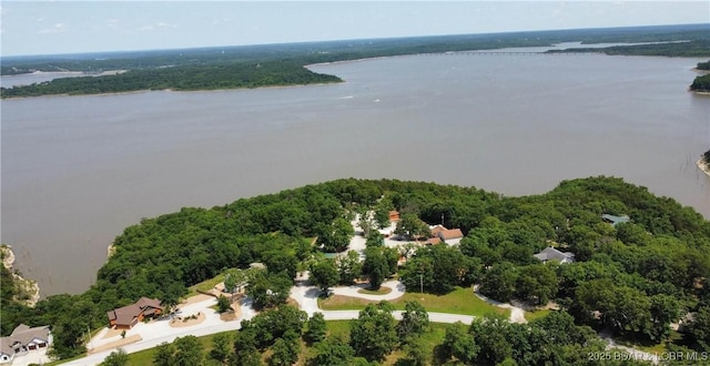 29720 Uu Hwy, Warsaw, MO 65355 - aerial overview of property's location with a nearby body of water and a forest